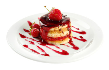Tasty biscuit cake with jam and berries