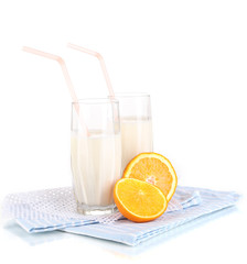 Delicious milk shakes with orange isolated on white