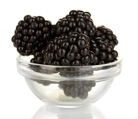 Sweet blackberry in glass bowl isolated on white