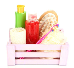 Obraz na płótnie Canvas Drewniane pudełko z produktów kosmetycznych na białym