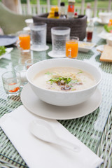Traditional porridge rice gruel in bowl