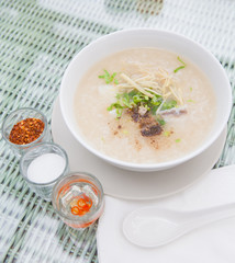 Traditional porridge rice gruel in bowl