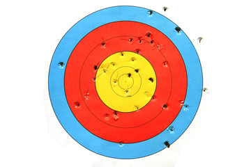 practice target used for shooting with bullet holes in it.