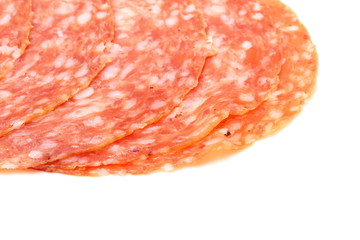 slices of Smoked Sausage isolated on white