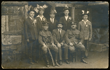 probably wedding guests - men and soldiers - circa 1940