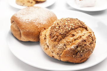 Fototapeta premium Fresh breads on white background.