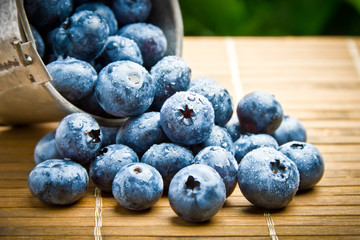 Delicious fruit berries in metal small pail