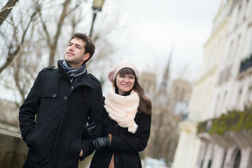 Dating couple walking in Paris