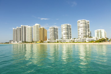 beautiful beach with condomiums and skyscraper in Sunny Islands
