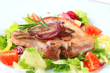 Pork chop with green salad