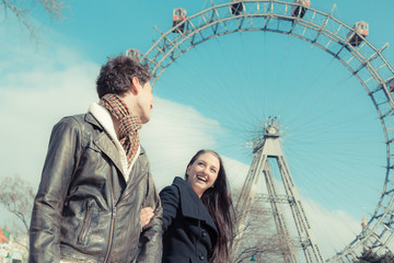 Naklejka premium Young Couple at Amusement Park in Wien