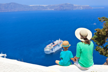 family looking at Santorini, Greece