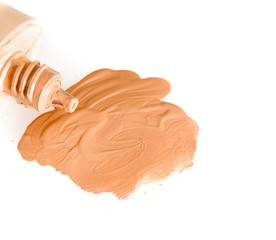 smudged liquid foundation isolated on white