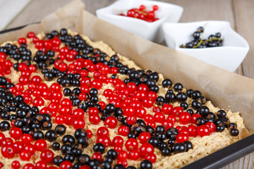 Fresh made red and black currant berries cake