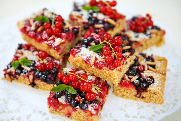 Fresh baked red and black currant berries cake