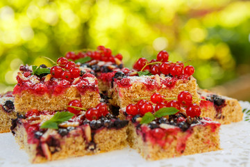 Fresh baked red and black currant berries cake
