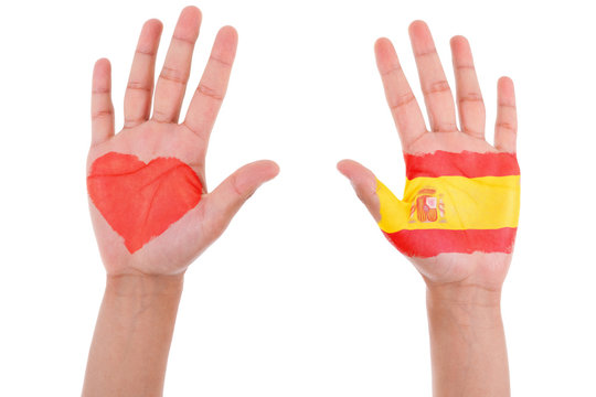 Hands with a painted heart and spanish flag, i love spain concep