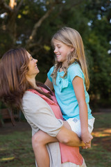 Fototapeta premium Mother looking at her daughter