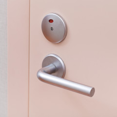 door with metallic handle