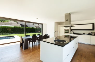 Foto op Aluminium Modern villa, interior, beautiful  kitchen and dining table © alexandre zveiger