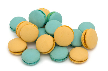 blue and yellow macarons over white
