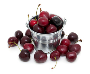 cherries in a metallic bucket