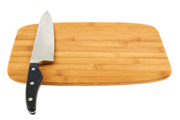 Knife over wooden cutting board - obrazy, fototapety, plakaty