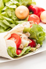 Tortilla wraps with meat and vegetables