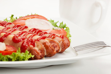 Closeup of baked sausage witch cheese