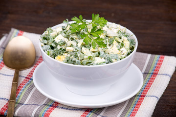 Salad of onions along with the egg and cucumber