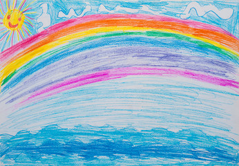 Children's drawing rainbow on  sea