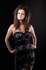 Fototapeta premium Sensual woman on black background studio shot