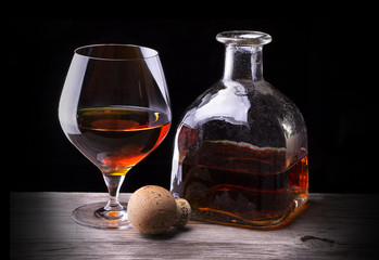 Cognac or brandy on a wooden table