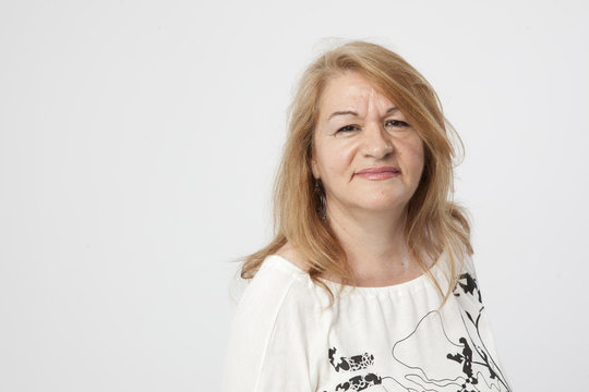 Senior Woman Portait Serious Expression White Background