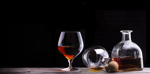 Cognac or brandy on a wooden table