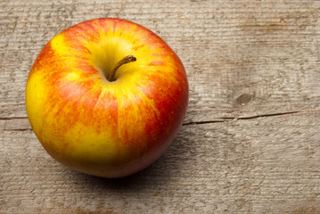 Apple isolated on wood
