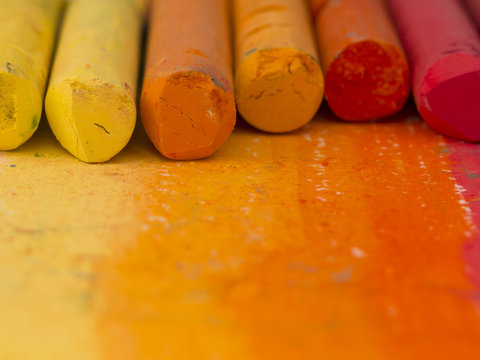 orange artistic crayons