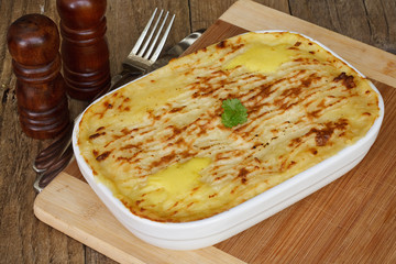 Fish pie on wooden table