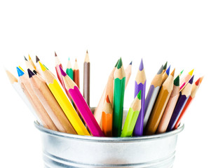Fototapeta premium Many different colored Rainbow pencils school supplies in tin bo