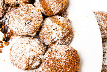 Pile of chocolate chips small cookies  on white background,