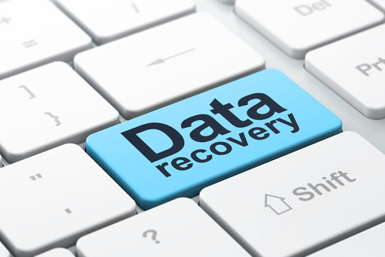 Information concept: Data Recovery on computer keyboard backgrou