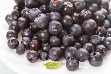 Blueberries on a white plate