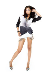 Model in a fashionable blouse and short jean shorts