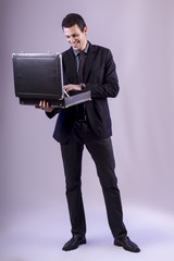 young business man on grey