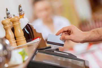 Close-up of cashier hands