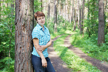 Woman in the pine forest