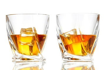 Glasses of whiskey, isolated on white