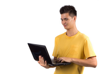 Young man using laptop isolated on white background
