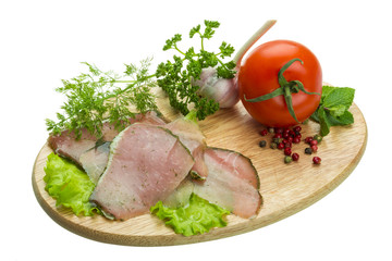 Ripe fresh ham with vegetables