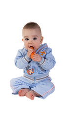 Baby eats carrot